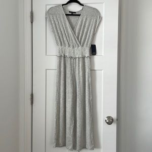 Caution to the Wind jumpsuit. Gray and white striped size small. New with tags